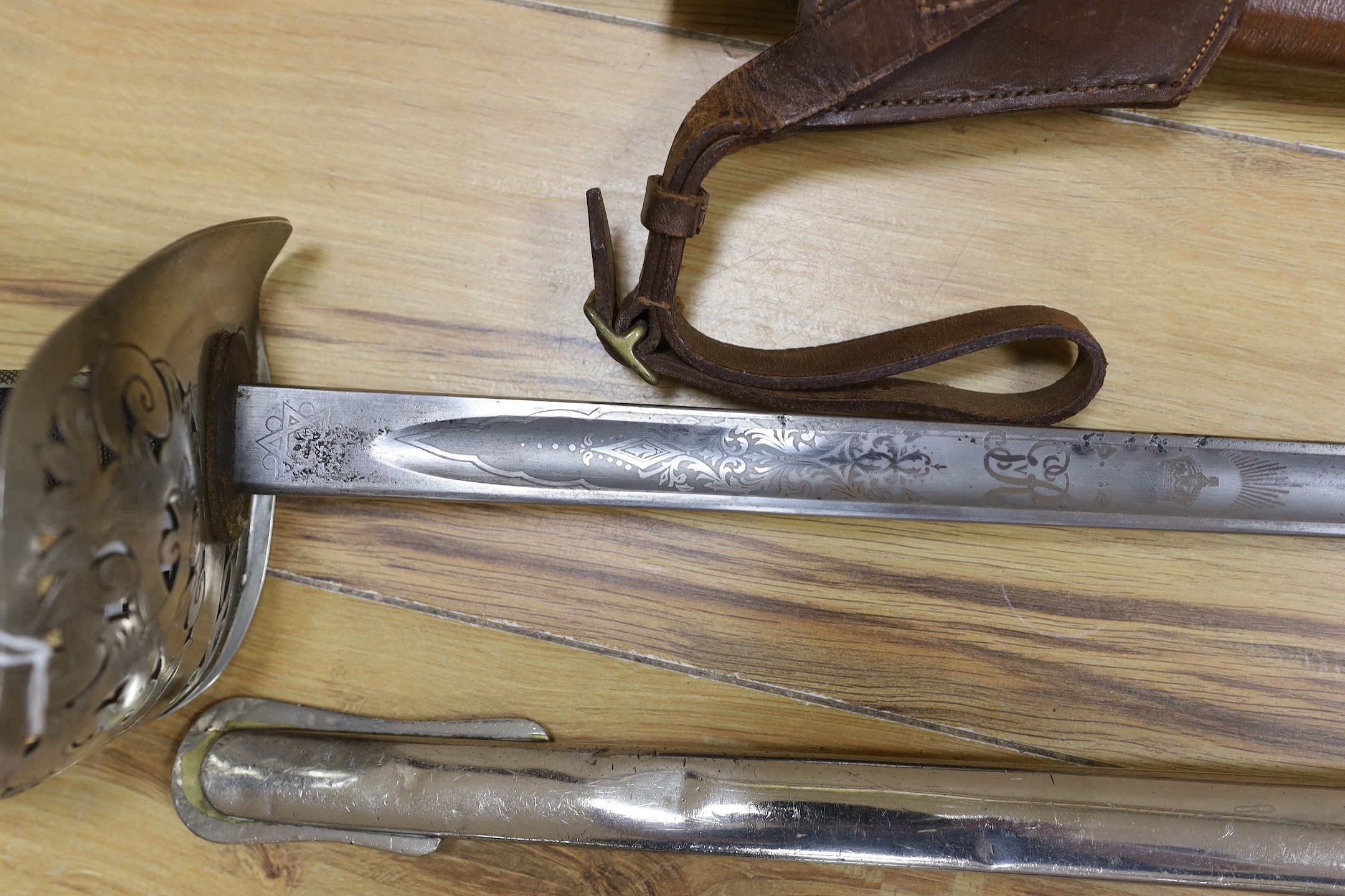 Two George V infantry officer's swords, 100cms long.